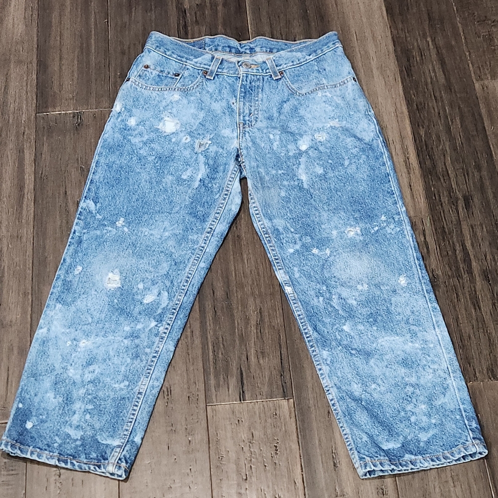 Acid washed Levi's  550 distressed jeans.  Red tab vintage Husky 29x25